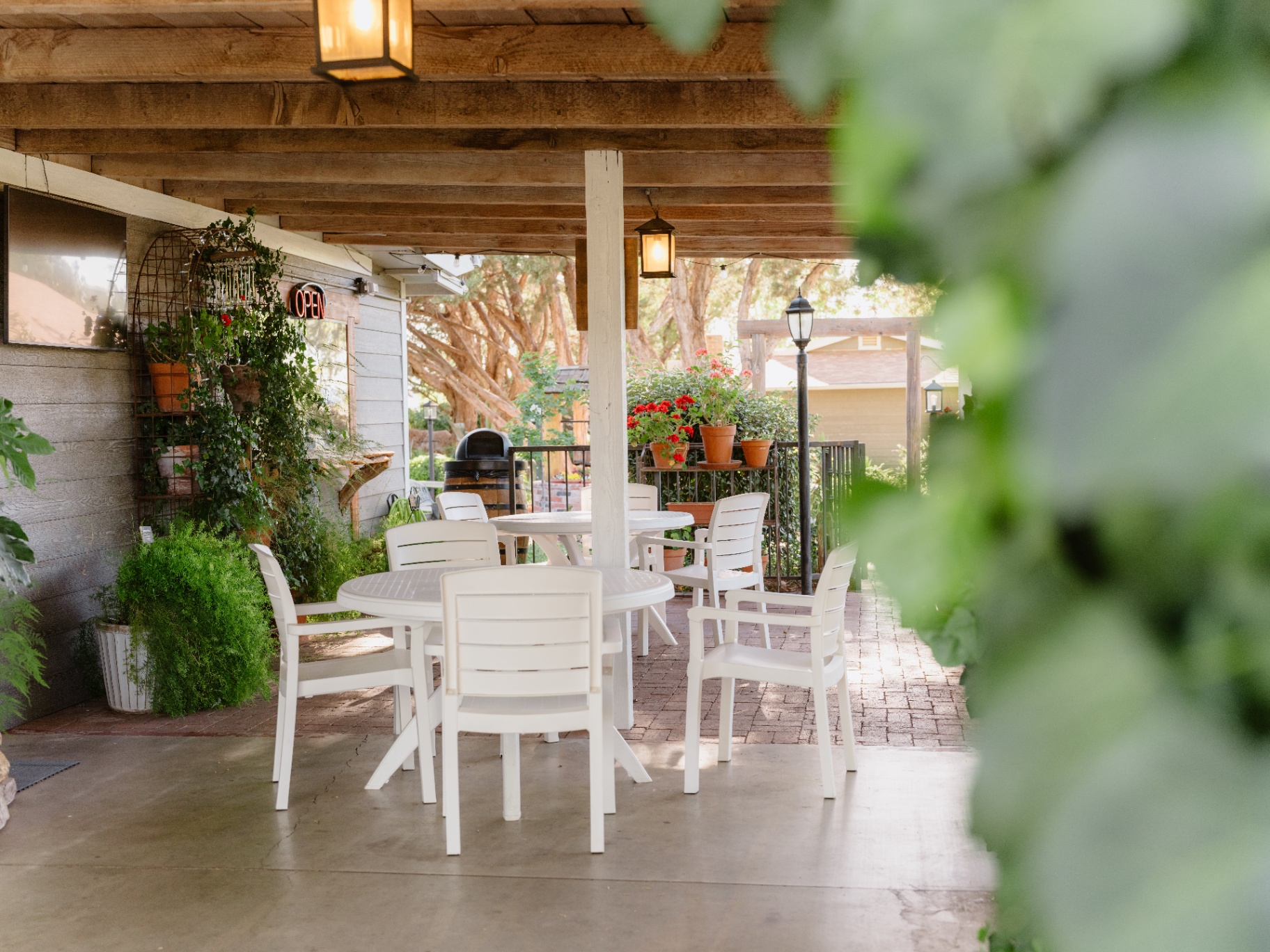 Covered patio dining area at the lodge