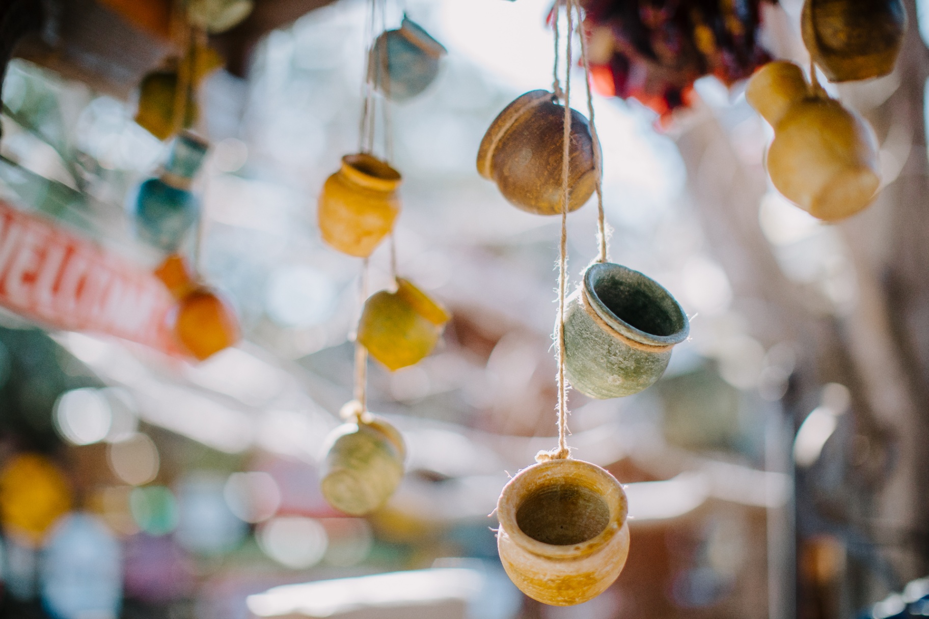 Handmade hanging pottery in a Sedona artisan shop