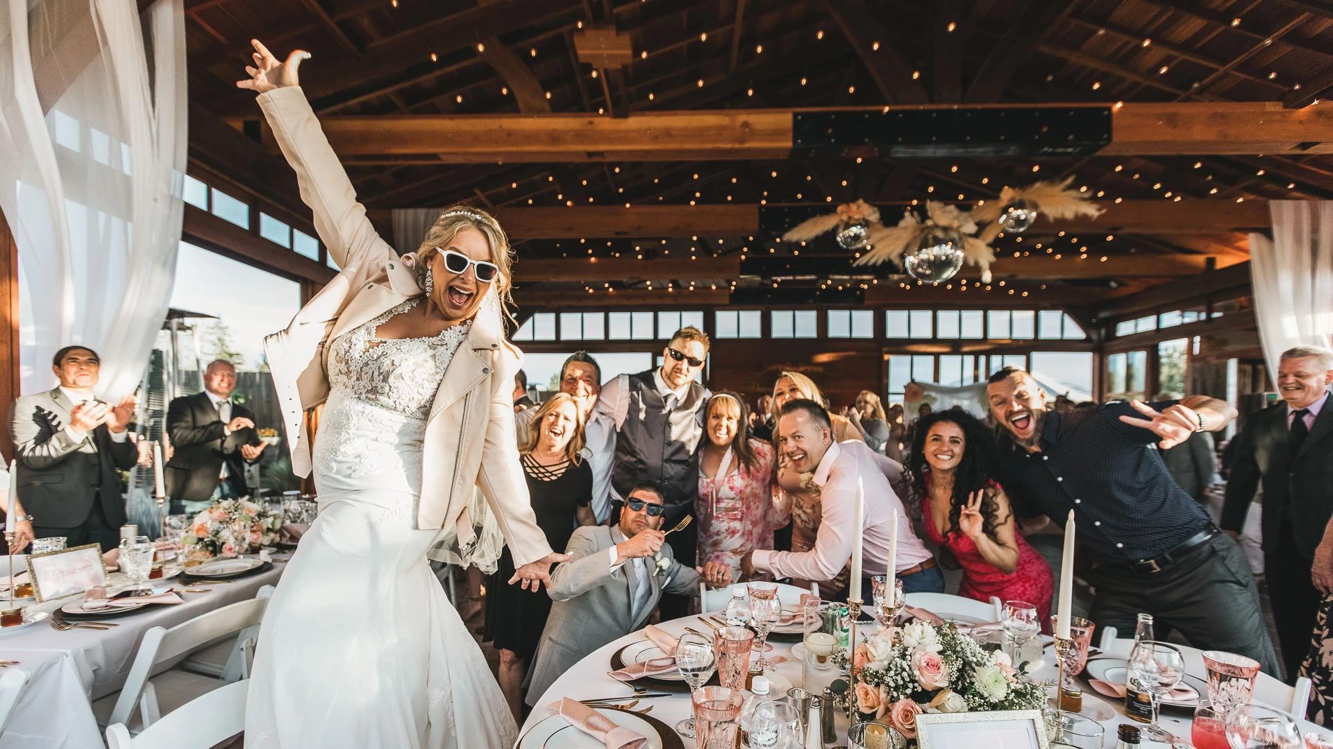 Romantic reception setup with candles and florals