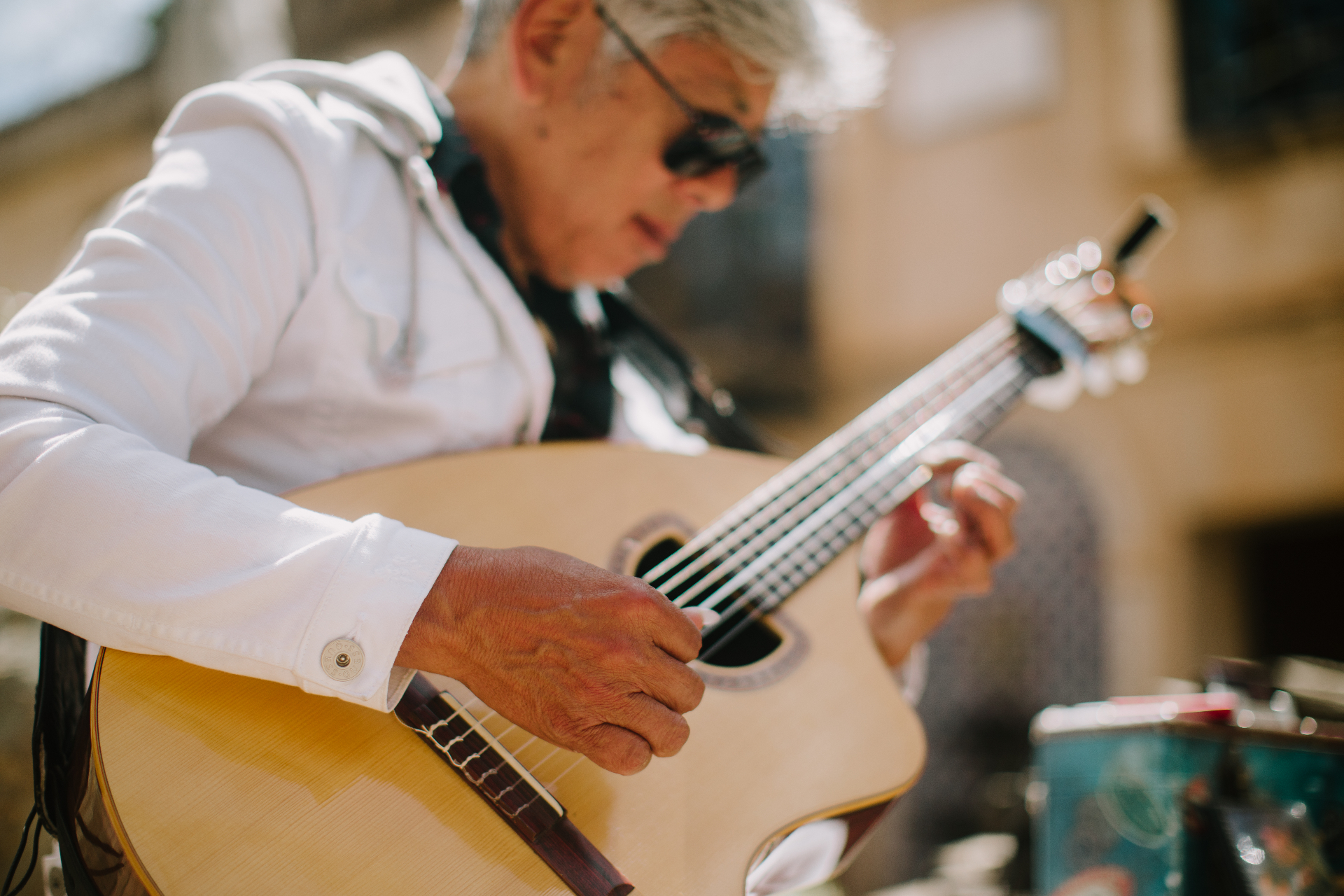 Street musician playing guitar in Sedona