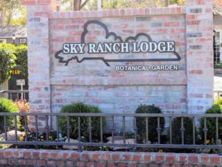Sky Ranch Lodge and Botanical Gardens sign